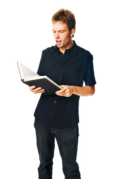 Jeune homme avec livre sur blanc — Photo