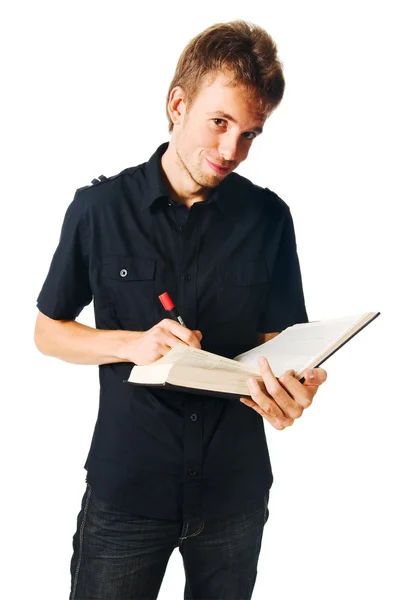 stock image Young man with book on white