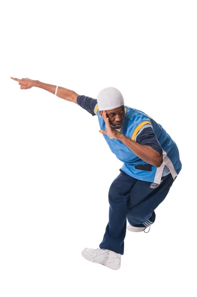 Hip-Hop junger Mann macht coolen Schritt auf weißem Rücken — Stockfoto