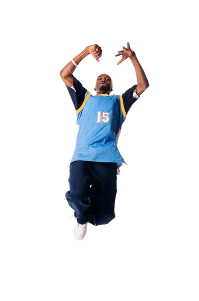 Hip-hop young man making cool move on white back — Stock Photo, Image