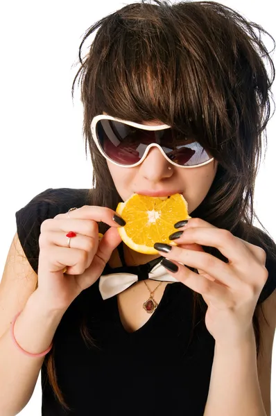 Girl eating orange — Stock Photo, Image