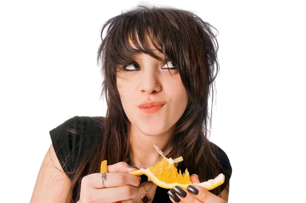 Girl eating orange — Stock Photo, Image