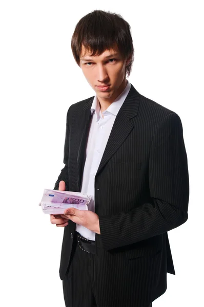 Young man with a pack of cash — Stock Photo, Image