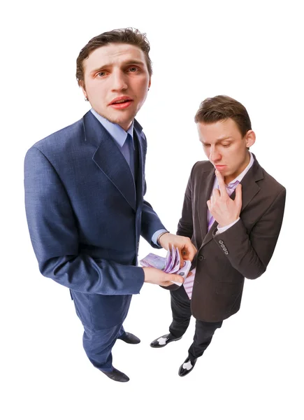 Two young businessmen with lots of cash — Stock Photo, Image