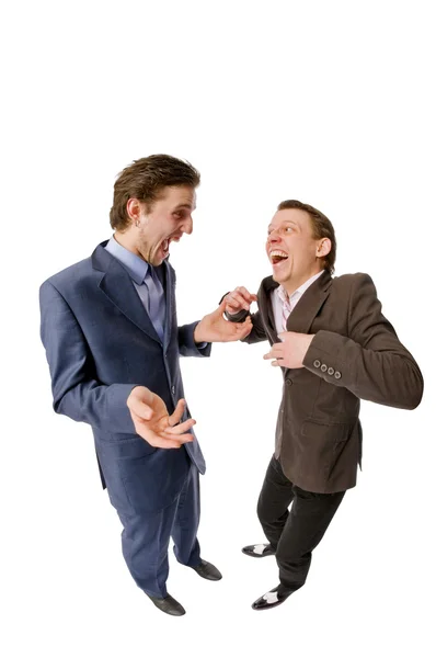 Два молодых бизнесмена что-то обсуждают — стоковое фото
