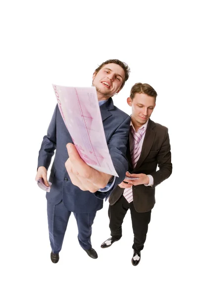 Due giovani imprenditori con un sacco di soldi — Foto Stock