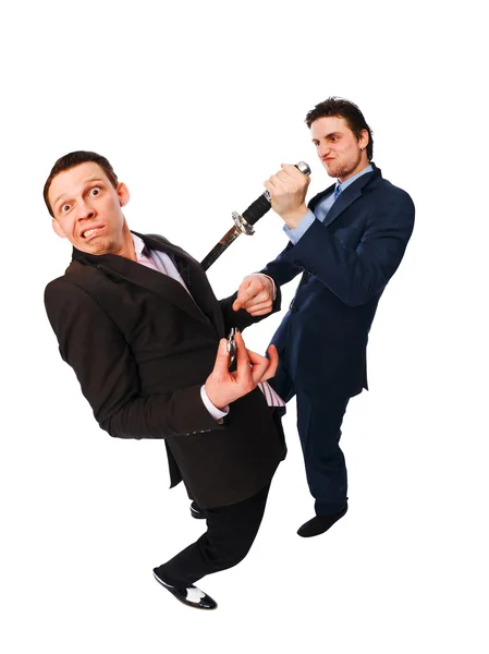 Businessman hitting the other with katana — Stock Photo, Image