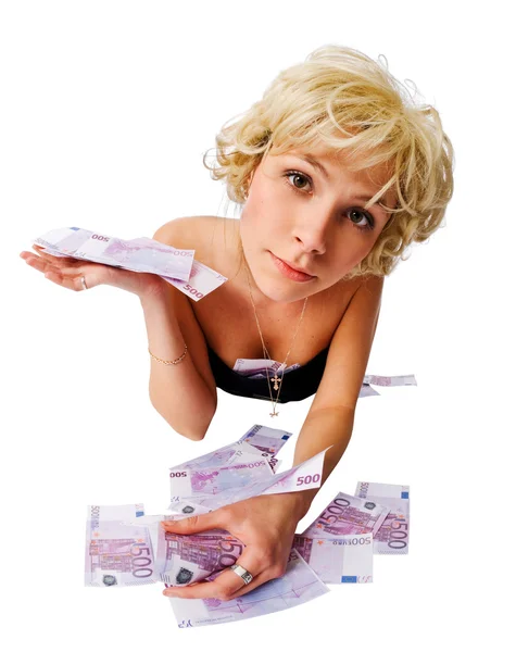 Blond girl with lots of cash on the floor — Stock Photo, Image
