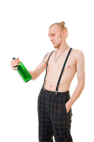 Hűvös fiatalember egy zöld üveg — Stock Fotó
