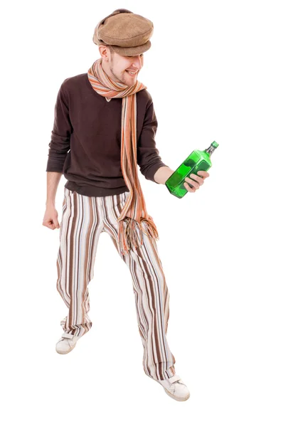 Jovem legal com uma garrafa verde — Fotografia de Stock