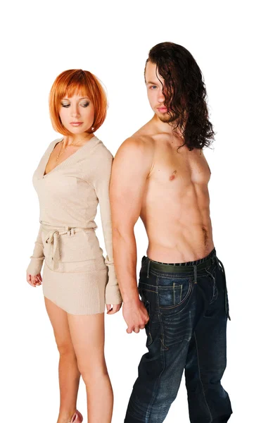 Young couple on plain background — Stock Photo, Image