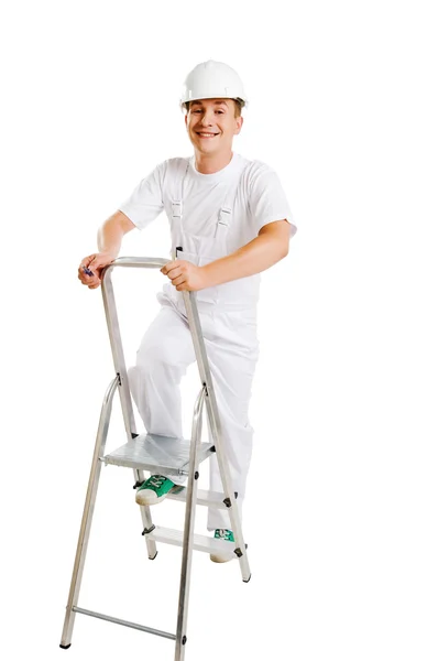 Werknemer op een ladder — Stockfoto
