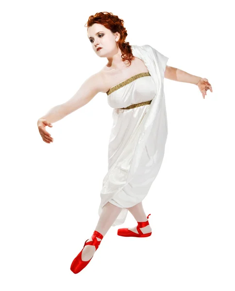 stock image Girl dressed in greek costume dancing on white