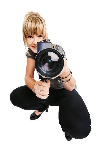 Young photographer on white background — Stock Photo, Image