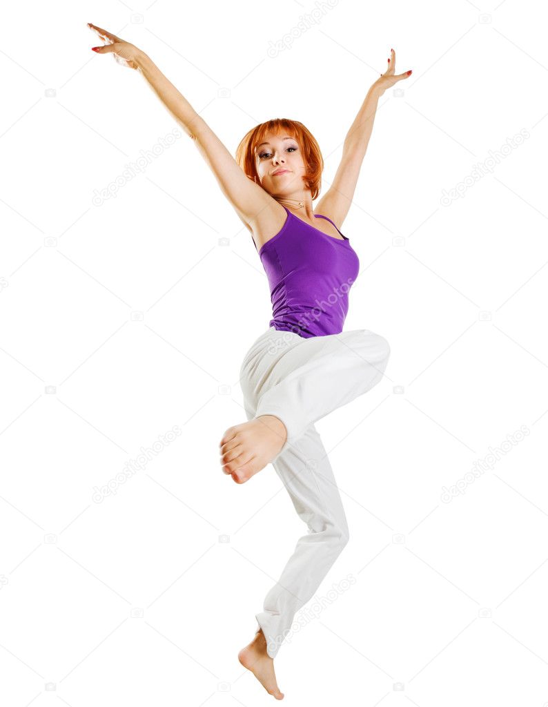 Red haired girl performing fitness exercises