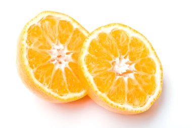 Fresh juicy clementine citrus fruit cut clipart