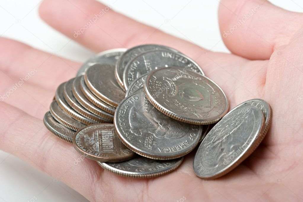 25 cents quarters change coins in a hand