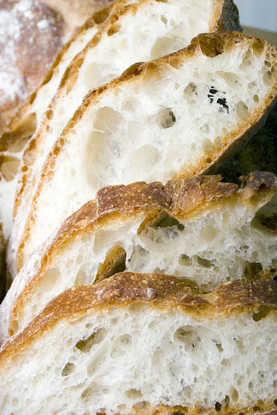 Slices of fresh baked bread close up — Stock Photo, Image