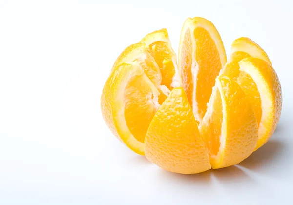 Saftiga mogen orange frukt skär Stockbild