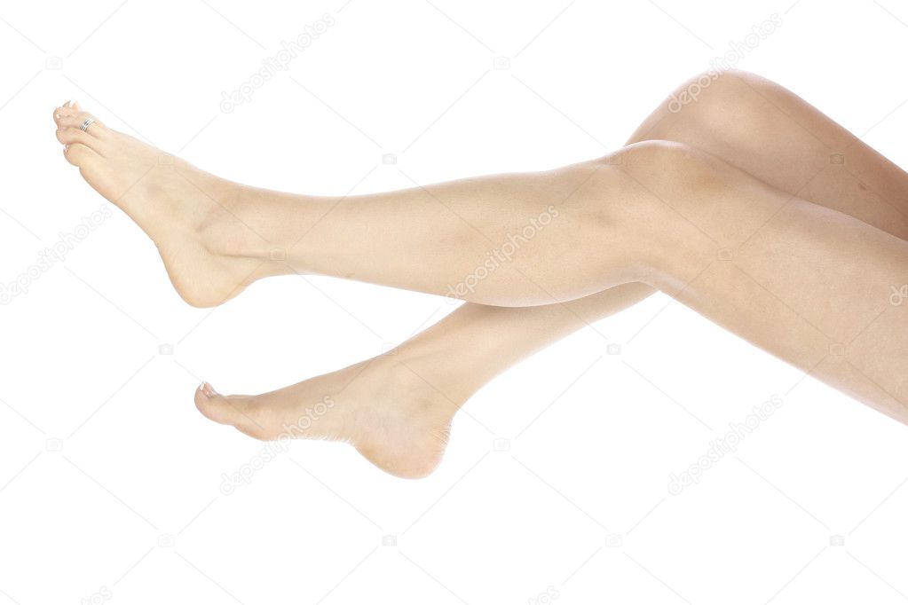 Womans legs and feet over white