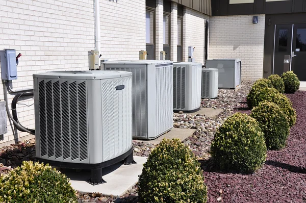 Several large air conditioning units Stock Photo