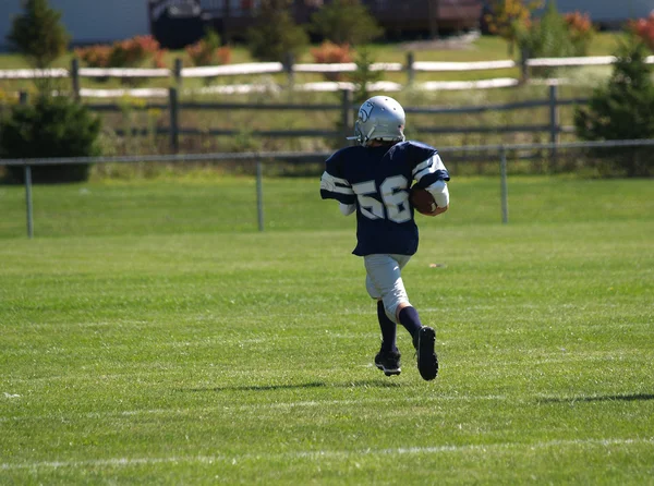 A correr para um touchdown — Fotografia de Stock