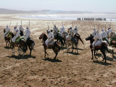 Moroccan cavalrymen in traditional ritua clipart