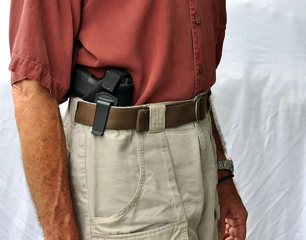 Скрытый переносной пистолет — стоковое фото