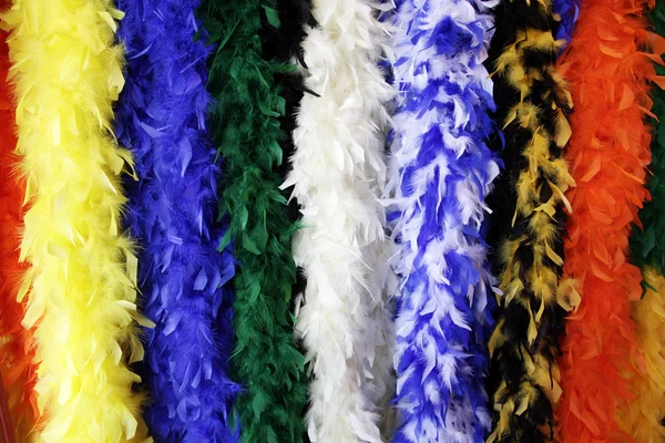 stock image Colorful, hanging feather boas.