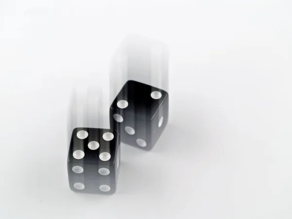 Black and white dice falling — Stock Photo, Image