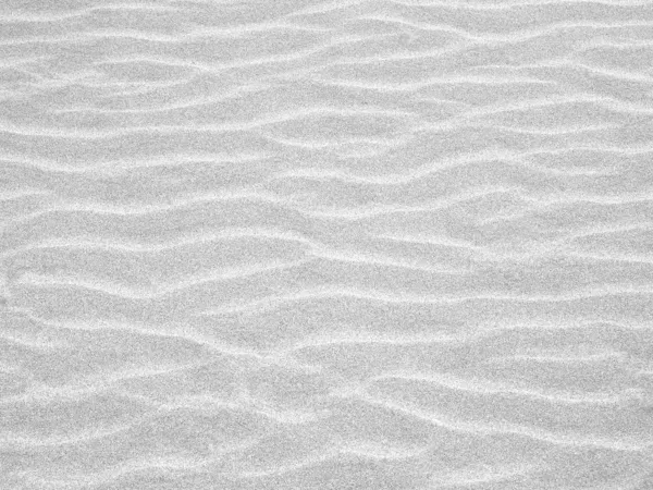 在海滩上的沙子的抽象背景涟漪 — 图库照片