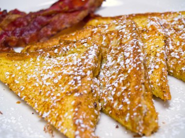 French Toast dusted with Powdered Sugar and Baco clipart