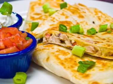 Chicken Quesadilla with Sour Cream and Salsa clipart