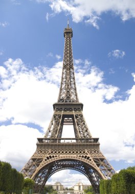 Eiffel tower on cloud sky clipart