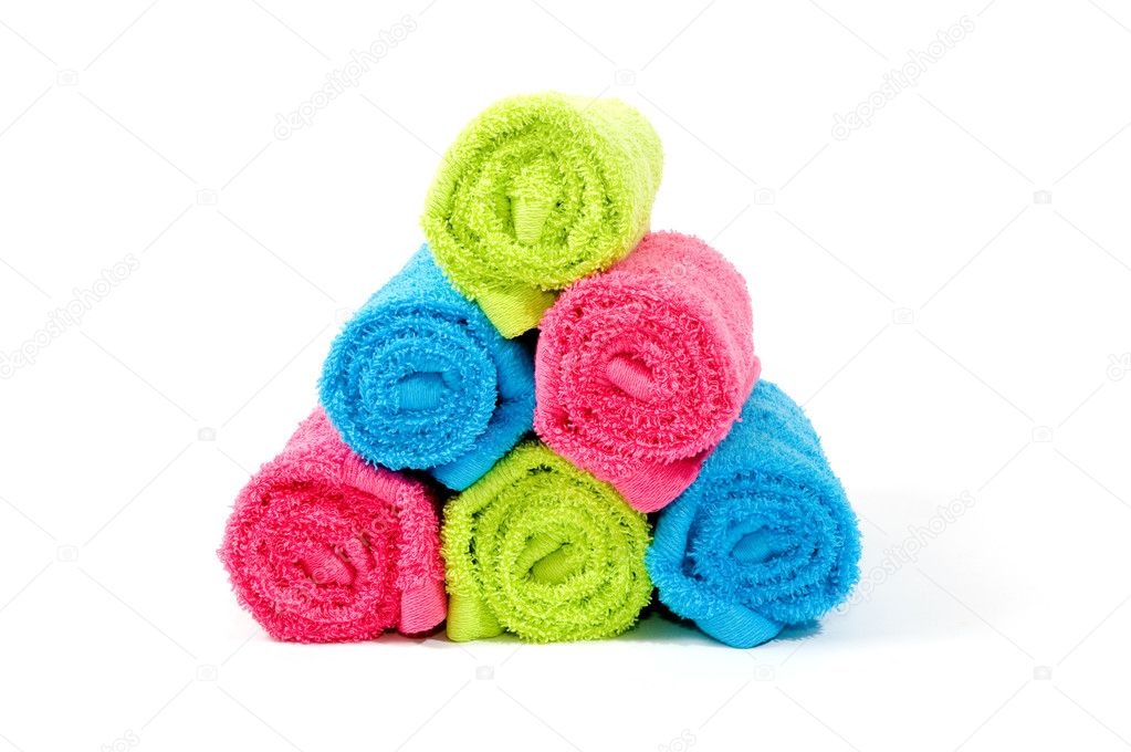 Colorful towel rolls on white