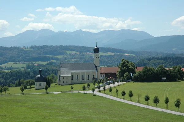 stock image Church in the bavarian mountains