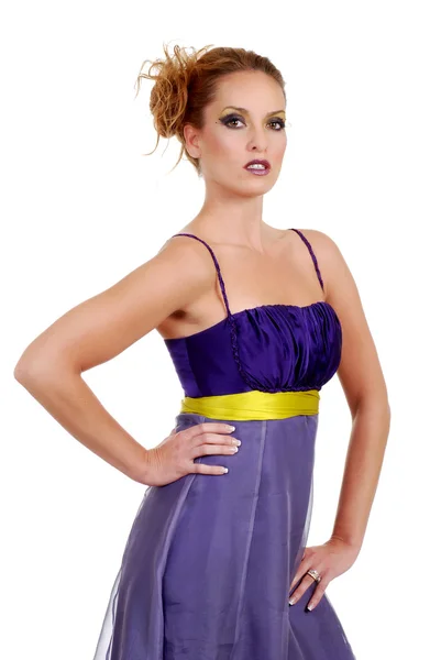 Beautiful woman wearing purple dress — Stock Photo, Image