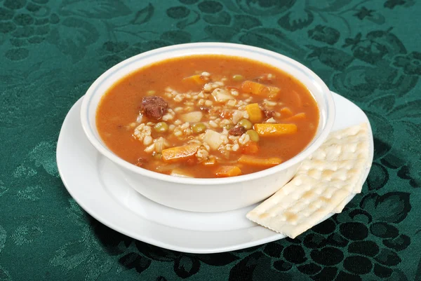 Beef barley soup with crackers — Stock Photo, Image