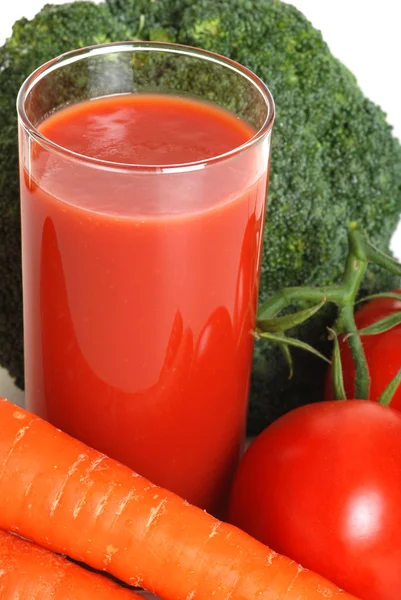 stock image Vegetable juice focus on rim of glass