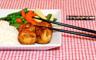 Chicken balls with chop sticks clipart