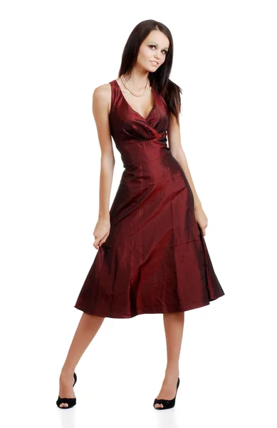 Beautiful brunette woman holding dress — Stock Photo, Image