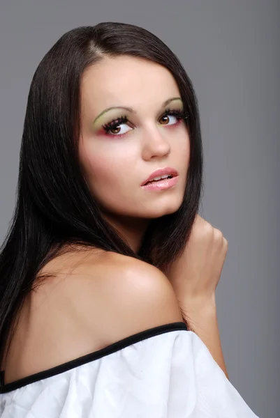 Vacker kvinna rosa grön ögonskugga — Stockfoto