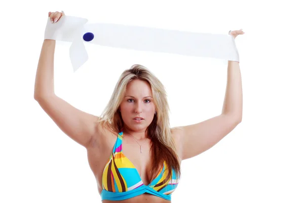 Blonde woman holding a sash — Stock Photo, Image