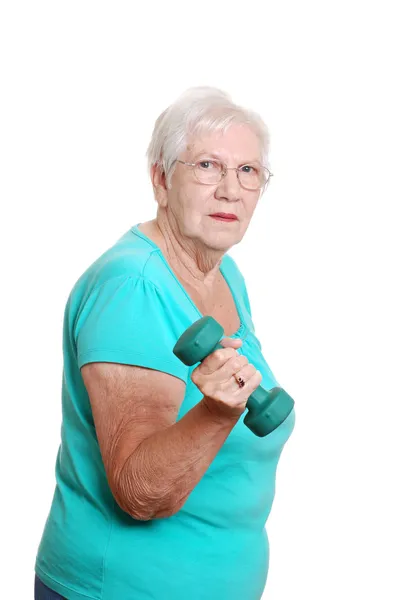 Mujer mayor activa haciendo ejercicio —  Fotos de Stock