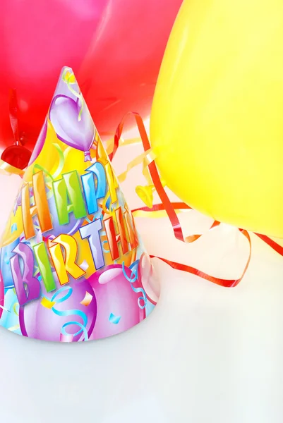 Födelsedag hatt med ballonger — Stockfoto