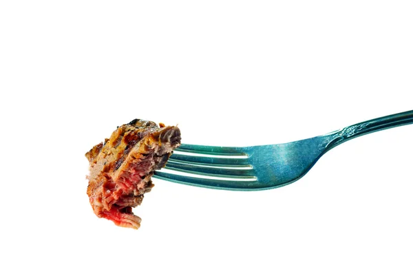 Geïsoleerde biefstuk op een vork — Stockfoto