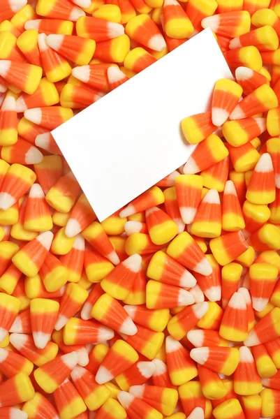 Candy corn with blank card — Stock Photo, Image
