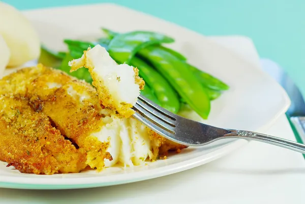Cod on a fork — Stock Image Cod on a fork Royalty Free Stock Images