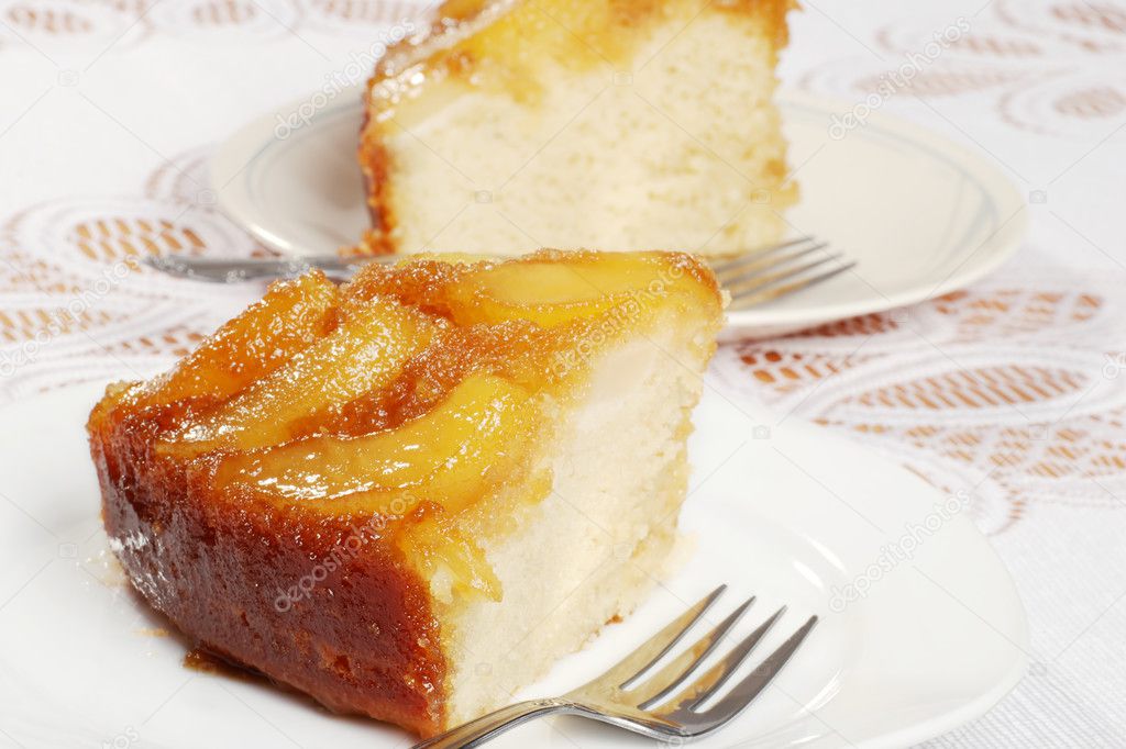 Closeup two slices upside down pear cake
