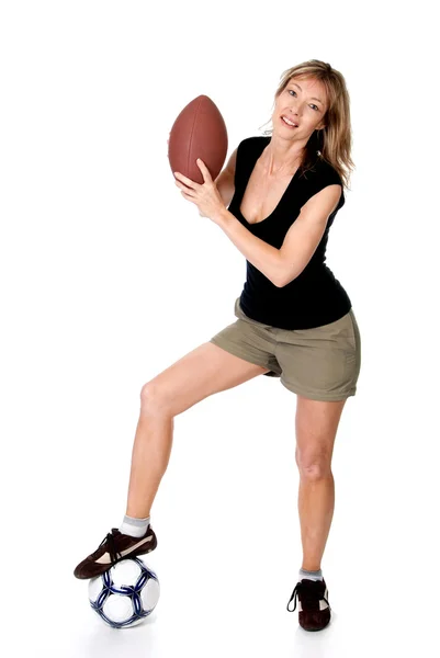 Donne con un calcio e un pallone da calcio — Foto Stock